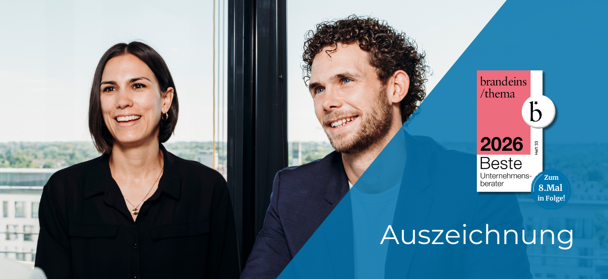 Zwei Berater und Auszeichnung Beste Berater 2026